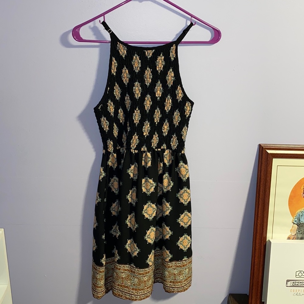 Dress with ruched waist and it has POCKETS